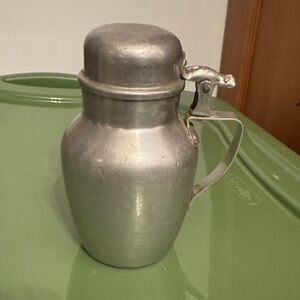 Vintage Viko aluminum syrup pitcher with a hinged lid.